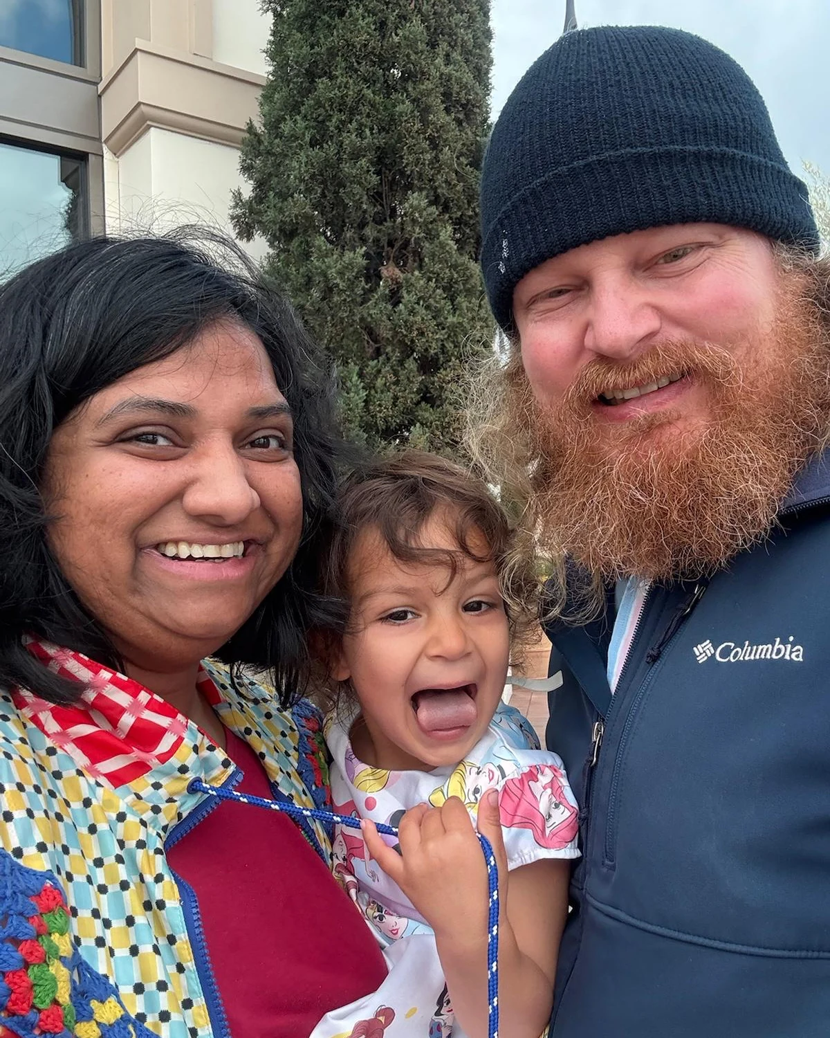 Rashmi with her husband and daughter