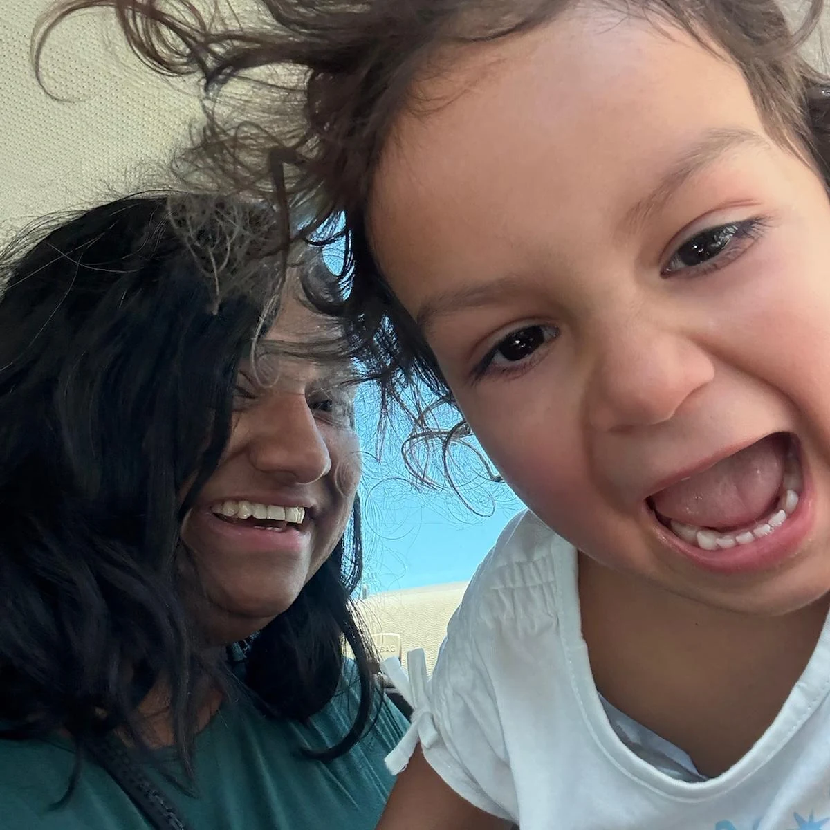 Rashmi sharing a joyful moment with her daughter